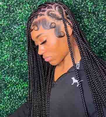 Heart-parted knotless Braids With Curls