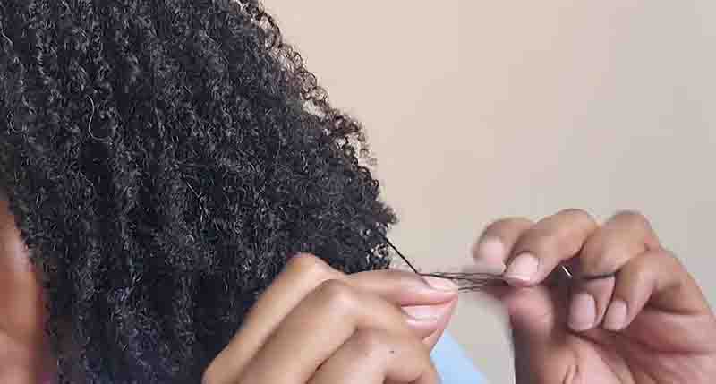 Applying a loosening agent to soft locs